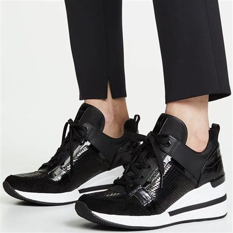 michael kors black and white tennis shoes|Michael Kors white platform sneakers.